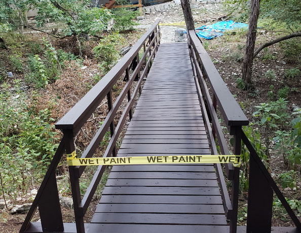 Custom built wood bridge with fresh paint